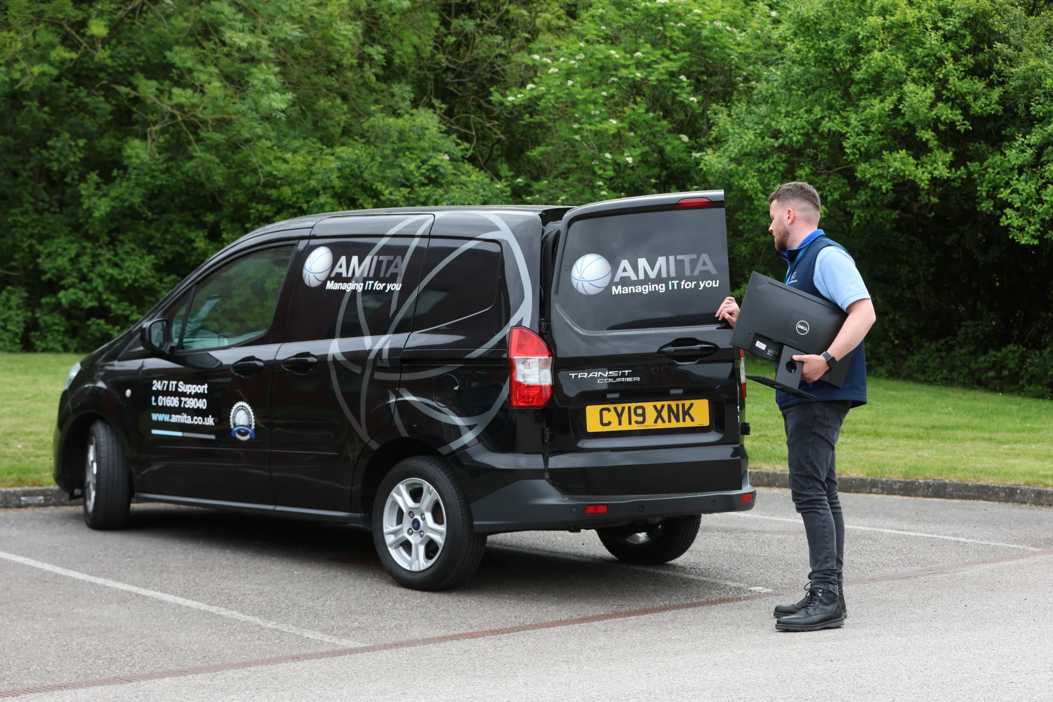 man-opening-amita-van